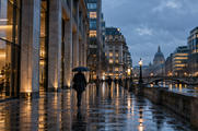 Synthetic editorial illustration. Rain-washed European financial district at blue hour with distant pedestrians and illuminated office buildings.
