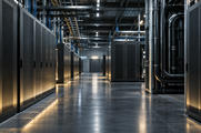 Synthetic editorial illustration. Unbranded high-density computing facility with cooling infrastructure for digital-assets news.