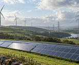 Synthetic editorial illustration. Wind turbines, solar panels and transmission infrastructure across a green landscape for climate-finance and renewable-energy news.