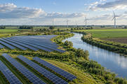 Synthetic editorial illustration. Solar panels and distant wind turbines beside a curving waterway in a lowland agricultural landscape.
