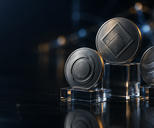 Synthetic editorial illustration. Three abstract unbranded metal token forms on glass blocks for cryptocurrency and digital-assets news.