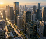 Synthetic editorial illustration. An elevated view looks across rectangular office towers and a grid of streets. Low morning sunlight warms the facades and throws long shadows between buildings.
