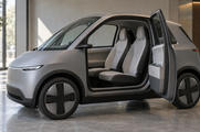 Synthetic editorial illustration. One compact anonymous vehicle with an open door framing two passenger seats; no steering wheel or pedals are visible.