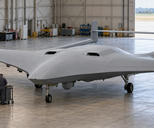Synthetic editorial illustration. An unmarked broad blended-wing aircraft with twin tail booms, a straight joining tailplane and upright fins stands in a daylit hangar. Two small workers seen from behind stand beside a tool trolley.